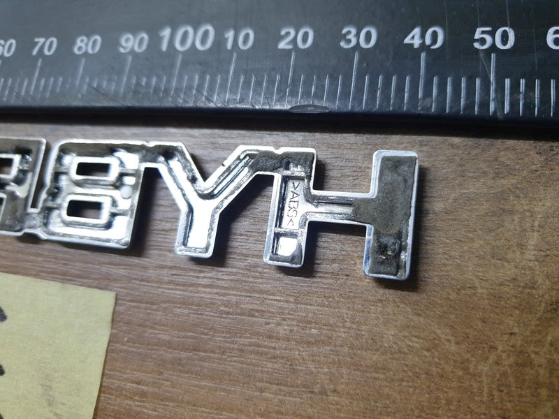 Original Used Toyota Corolla Cross XS Boot Lid 'HYBRID' Badge