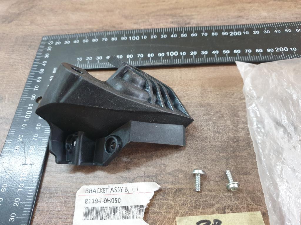 Original New Toyota Aygo Left Headlight Bracket