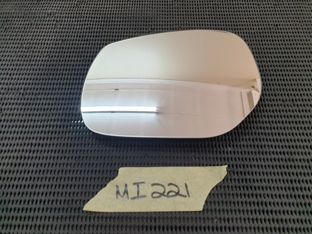 Nissan Almera Left Outer Mirror Glass