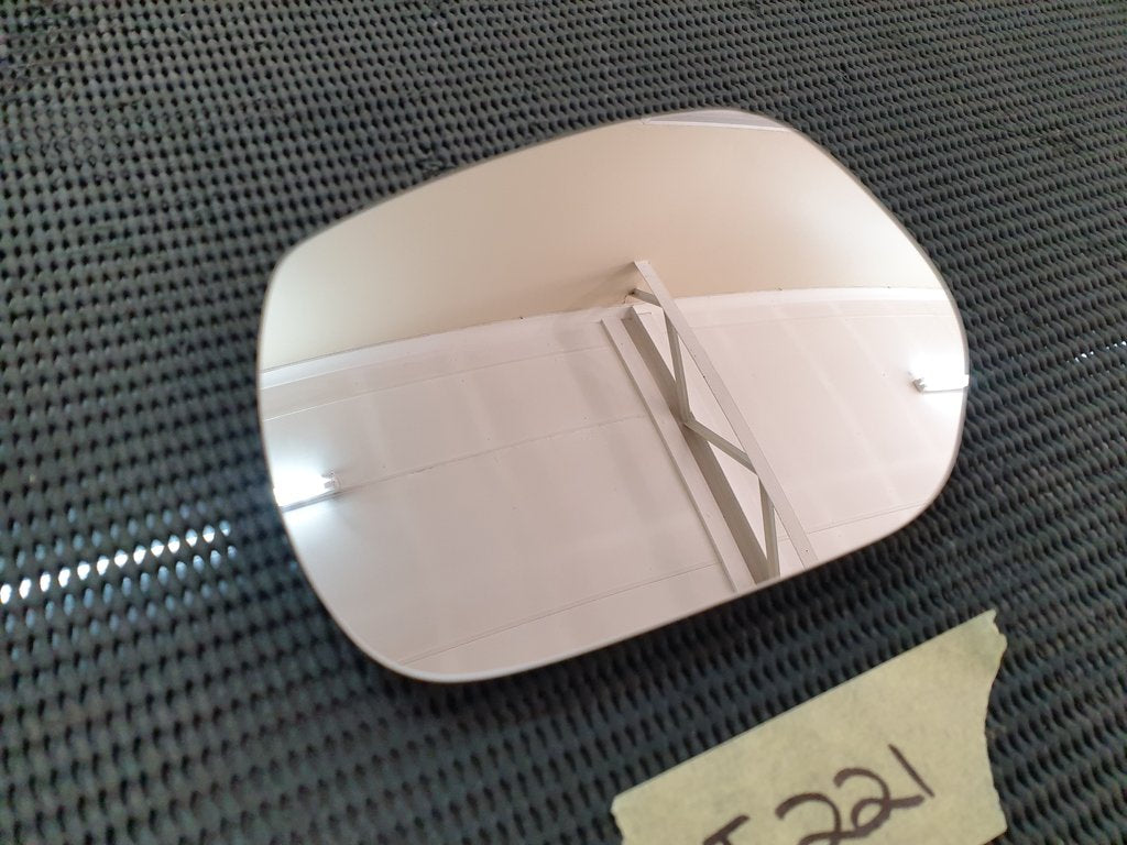Nissan Almera Left Outer Mirror Glass