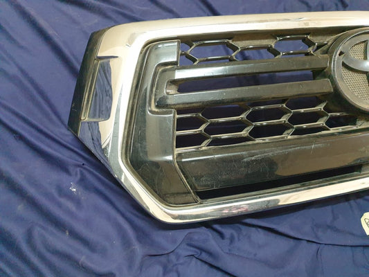 Toyota Hilux Radiator Grille - Light Wear and Tear, Broken clips
