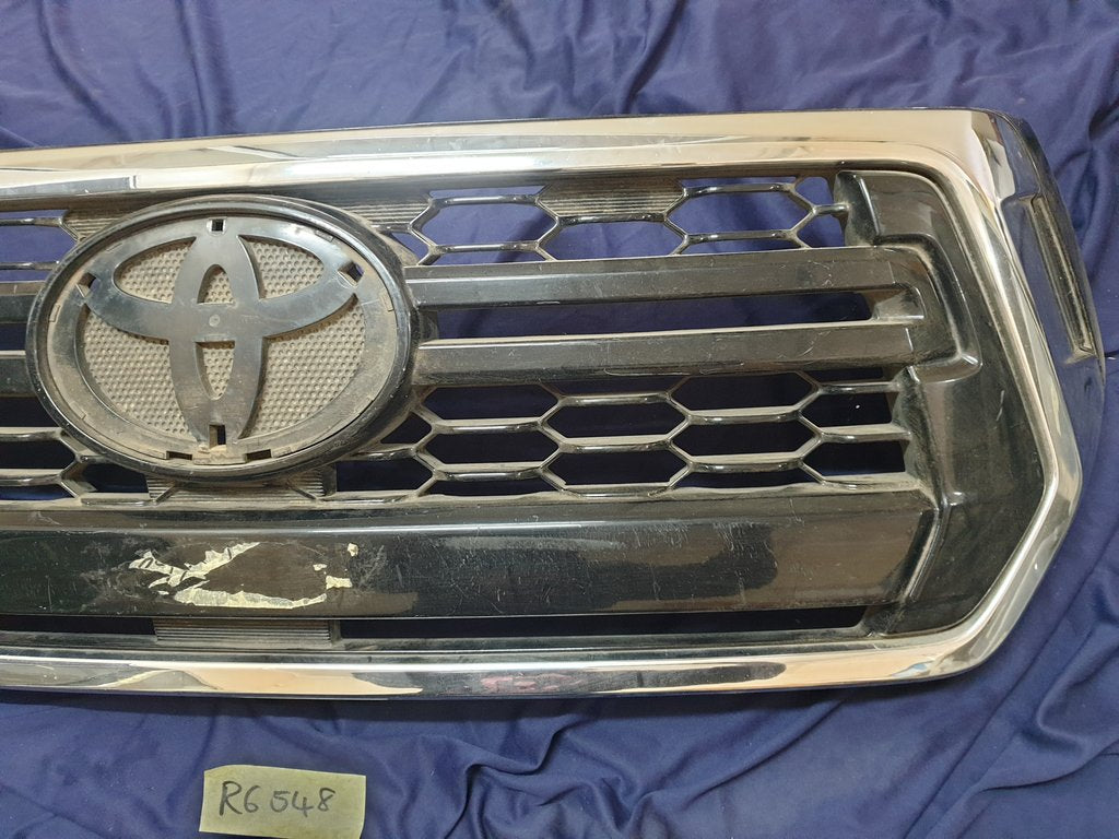 Toyota Hilux Radiator Grille - Light Wear and Tear, Broken clips