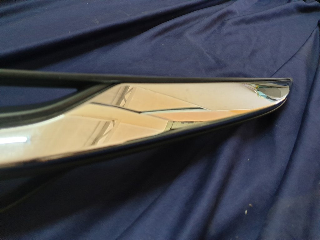 Toyota Starlet Radiator Grille - Light Wear and Tear, one clip broken