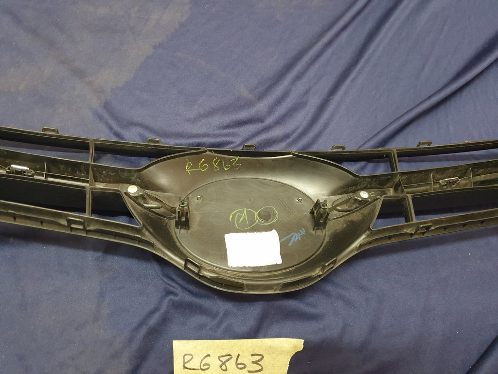 Toyota Starlet Radiator Grille - Light Wear and Tear, one clip broken