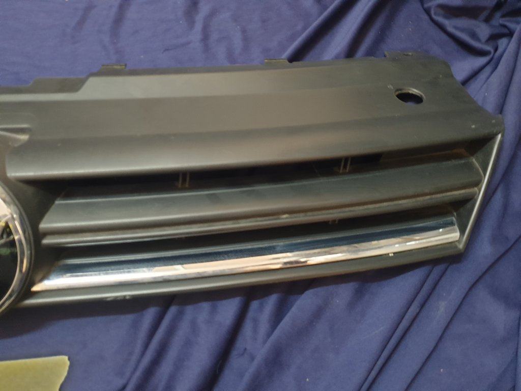 Volkswagen Polo 2018, 2019, 2020, 2021, 2022, 2023 Radiator Grille - Deep abrasion, Wear and Tear, Broken badge