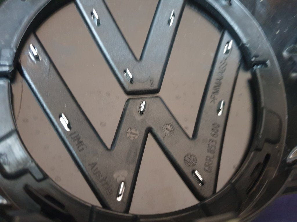 Volkswagen Polo 2018, 2019, 2020, 2021, 2022, 2023 Radiator Grille - Deep abrasion, Wear and Tear, Broken badge