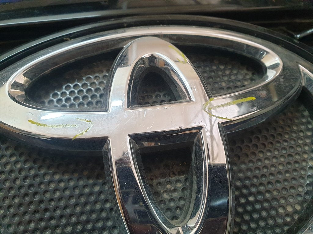 Toyota Hilux Radiator Grille - Chrome Scratches, Deep Scuffs