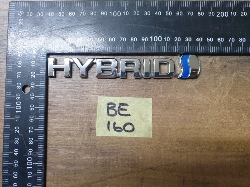 Original Used Toyota Corolla Cross XS Boot Lid 'HYBRID' Badge