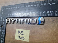 Original Used Toyota Corolla Cross XS Boot Lid 'HYBRID' Badge