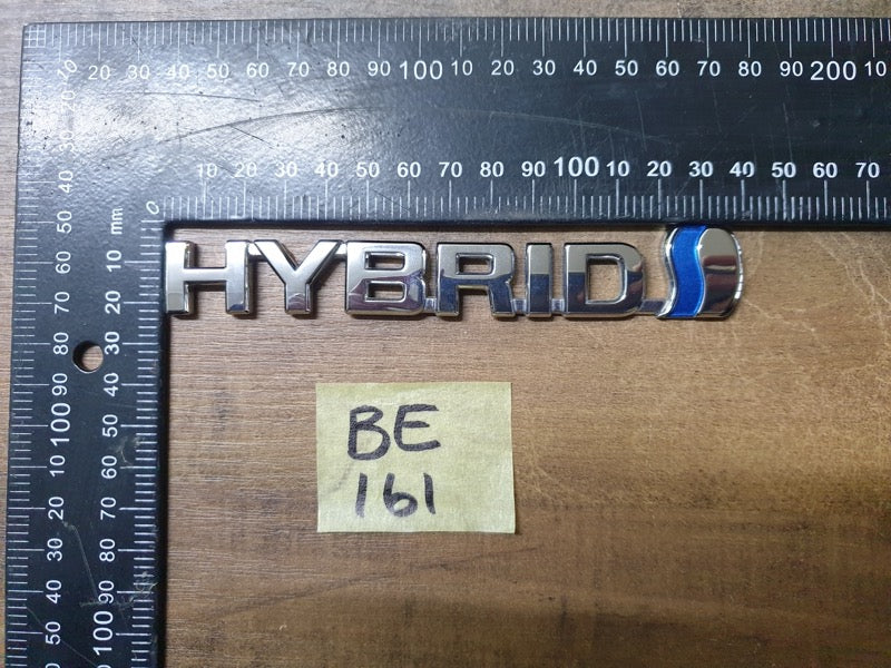 Original Used Toyota Corolla Cross XS Boot Lid 'HYBRID' Badge