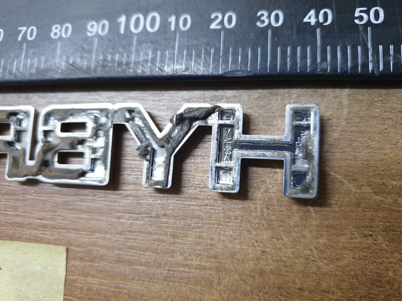 Original Used Toyota Corolla Cross XS Boot Lid 'HYBRID' Badge