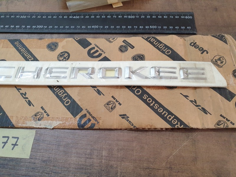 Original New Jeep Grand Cherokee Front Door 'GRAND CHEROKEE' Badge