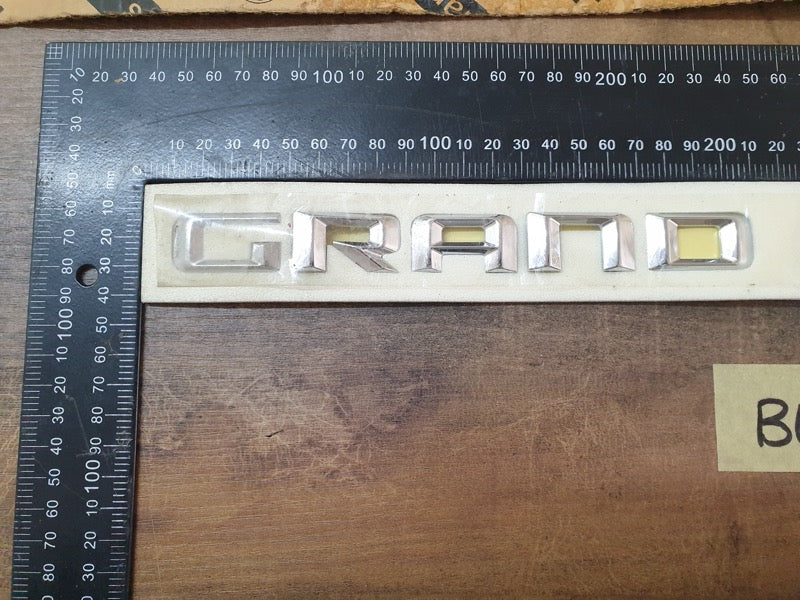 Original New Jeep Grand Cherokee Front Door 'GRAND CHEROKEE' Badge