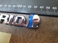 Original Used Toyota Corolla Cross Front Fender 'HYBRID' Badge