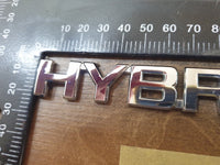 Original Used Toyota Corolla Cross Front Fender 'HYBRID' Badge