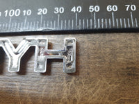 Original Used Toyota Corolla Cross Front Fender 'HYBRID' Badge
