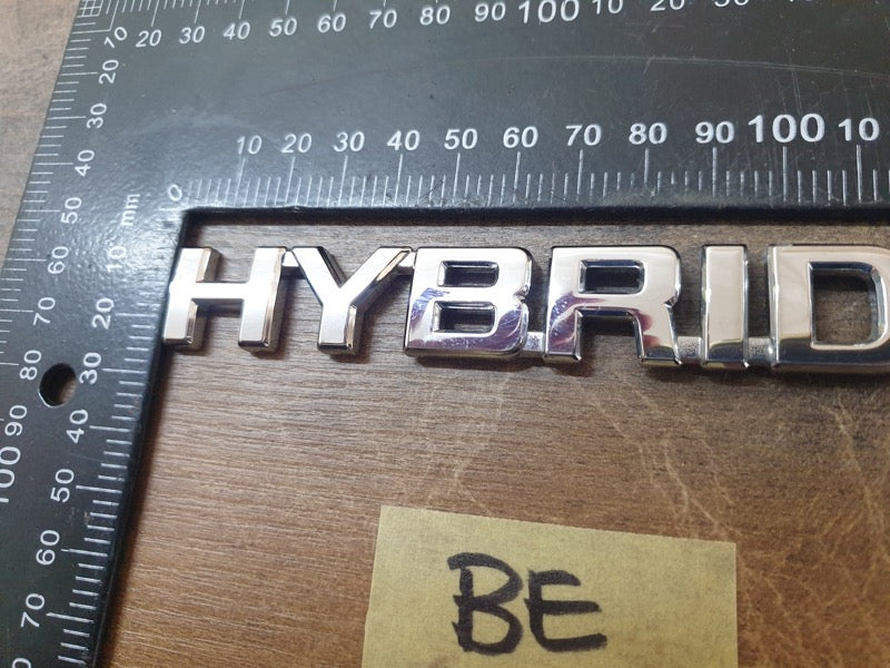 Original Used Toyota Corolla Cross Front Fender 'HYBRID' Badge