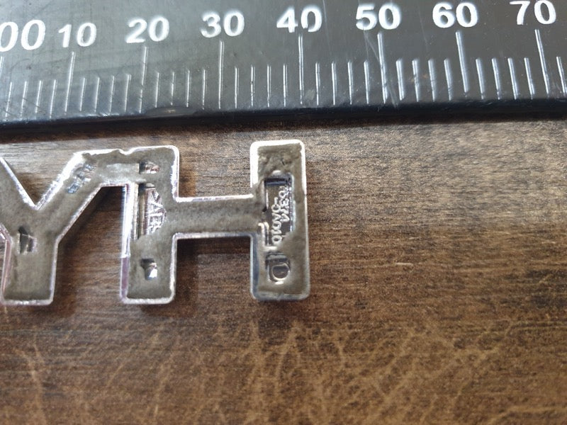 Original Used Toyota Corolla Cross Front Fender 'HYBRID' Badge