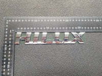 Toyota Hilux Front Door Badge "HILUX"