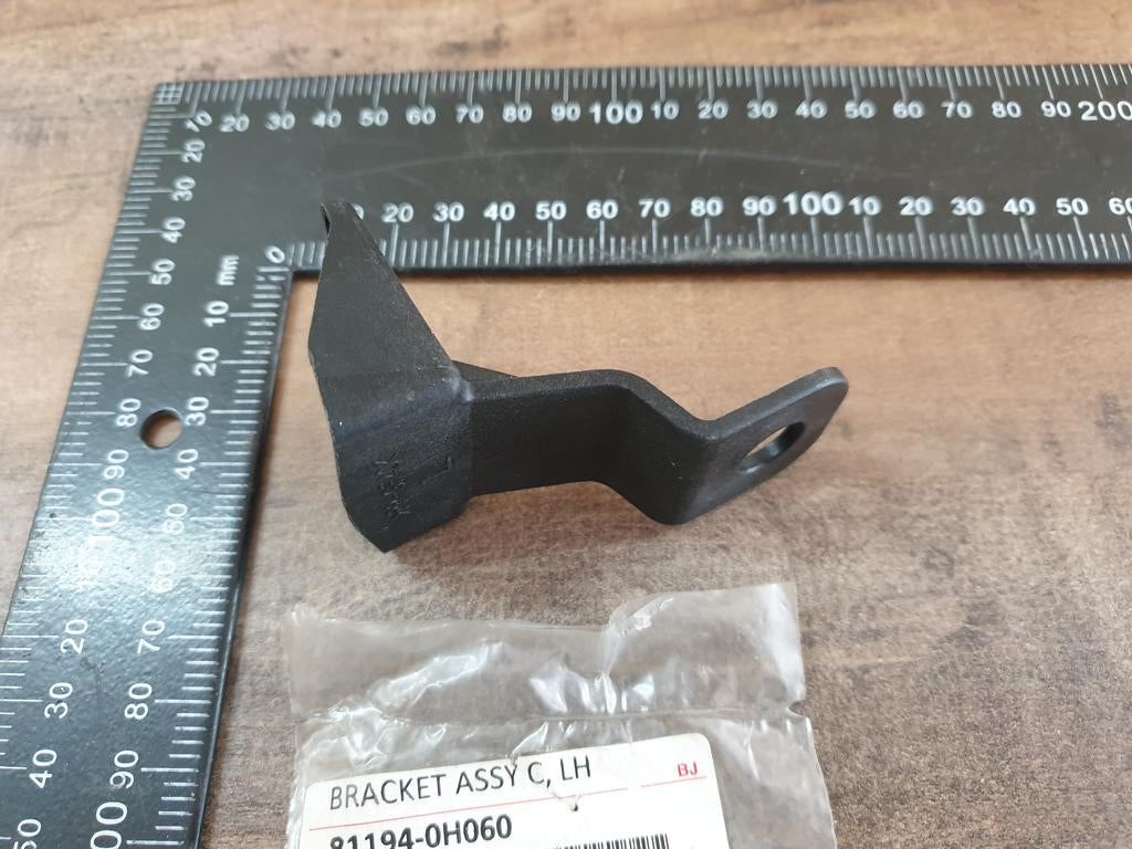 Original New Toyota Aygo Left Headlight Bracket