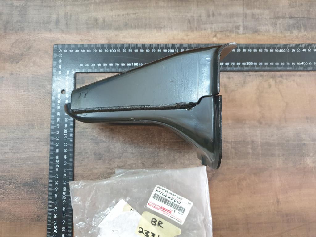 Original New Toyota Hilux Left Front Cab Mounting Bracket