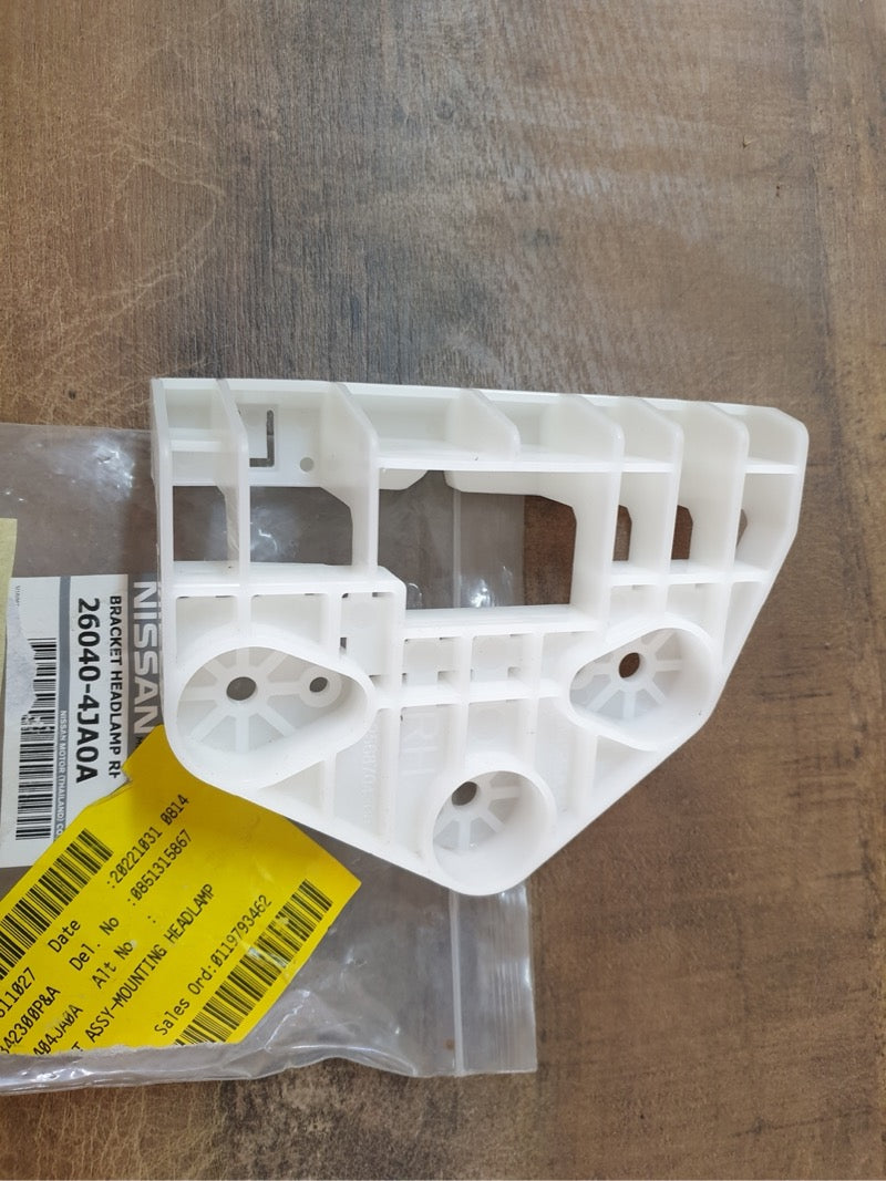 Original New Nissan Navara Right Lower Headlight Bracket