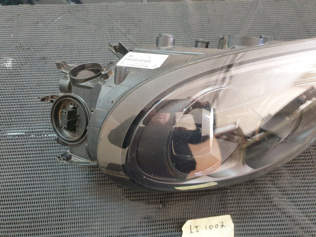 Original Used Porsche Cayman Right Headlight - Broken pieces of lens included