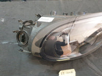 Original Used Porsche Cayman Right Headlight - Broken pieces of lens included