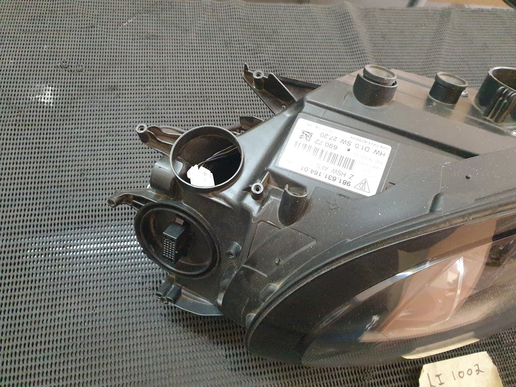 Original Used Porsche Cayman Right Headlight - Broken pieces of lens included