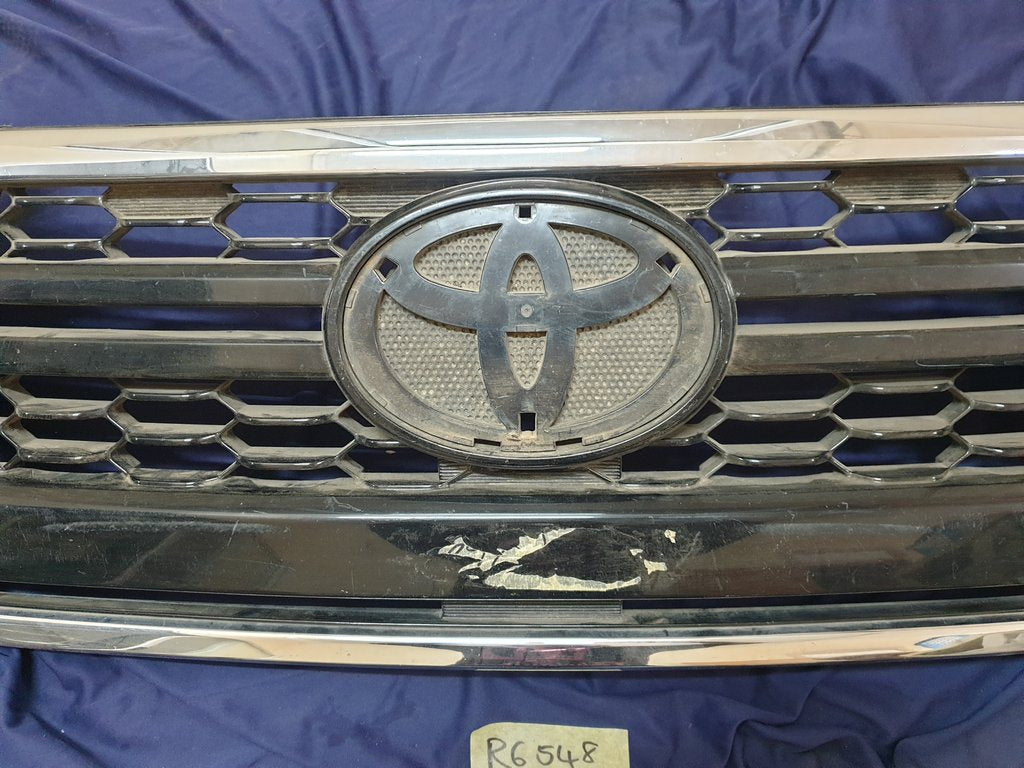Toyota Hilux Radiator Grille - Light Wear and Tear, Broken clips