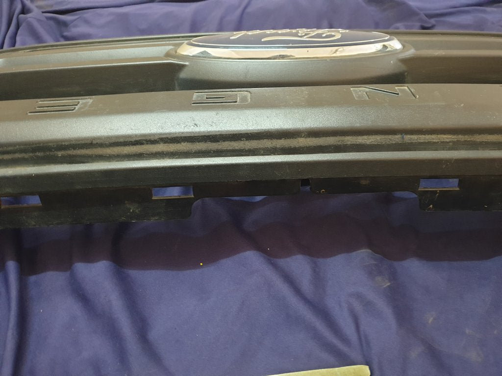 Ford Ranger Radiator Grille - Light Wear and Tear, Broken bracket