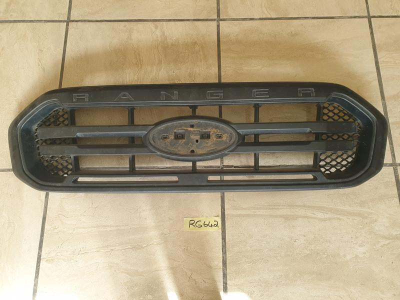 Original Used Ford Ranger Radiator Grille - Light Wear and Tear, Broken bracket