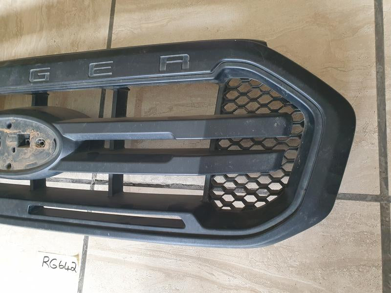 Original Used Ford Ranger Radiator Grille - Light Wear and Tear, Broken bracket