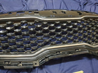 KIA Sportage Radiator Grille - Light Wear and Tear, Small scratches