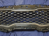 KIA Sportage Radiator Grille - Light Wear and Tear, Small scratches