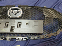 Mazda 3 Radiator Grille - Wear and Tear, Minor damage to mesh