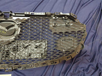 Mazda 3 Radiator Grille - Wear and Tear, Minor damage to mesh