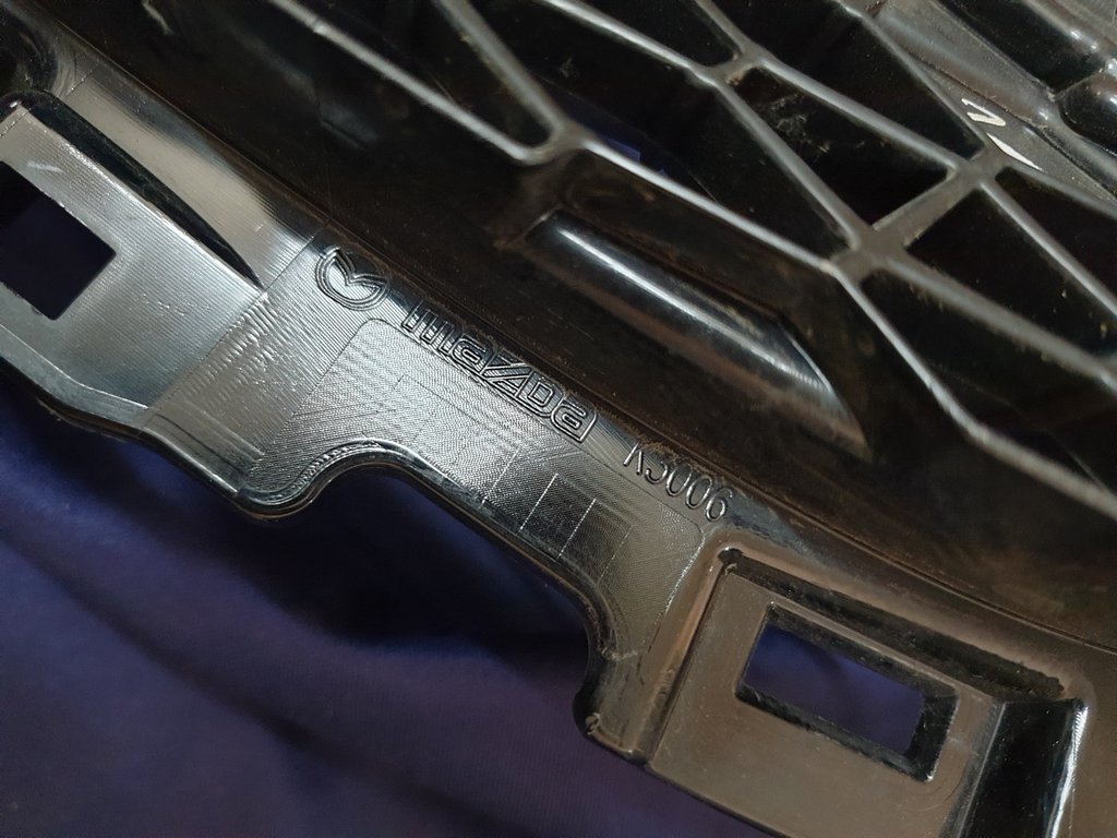 Mazda 3 Radiator Grille - Wear and Tear, Minor damage to mesh