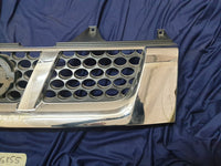 Nissan NP300 Radiator Grille - Chrome cracked, scratches
