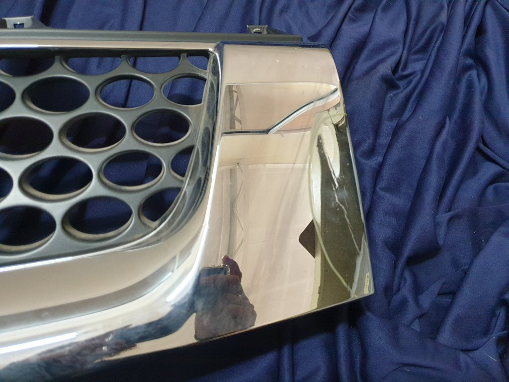 Nissan NP300 Radiator Grille - Chrome cracked, scratches