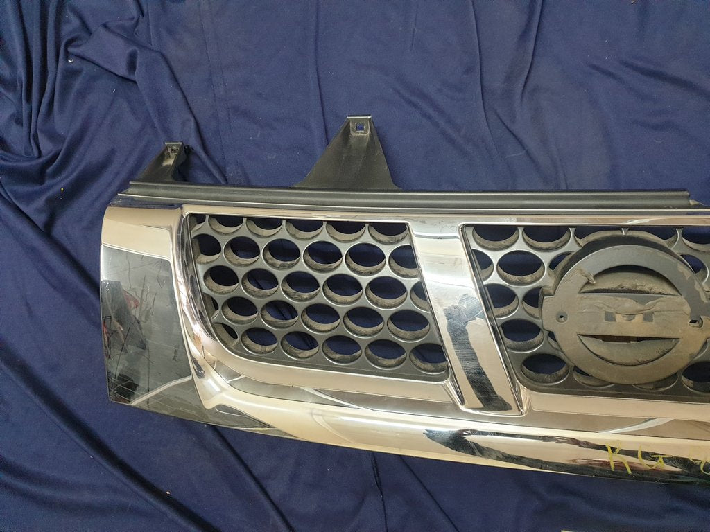 Nissan NP300 Radiator Grille - Chrome cracked, scratches