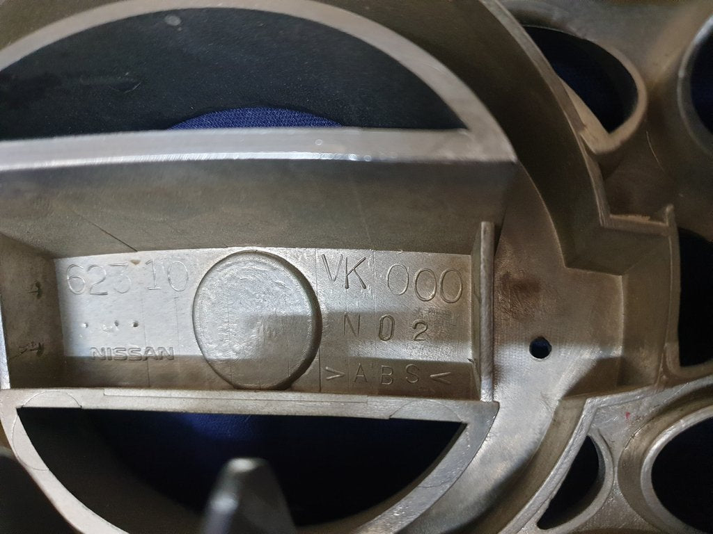 Nissan NP300 Radiator Grille - Chrome cracked, scratches