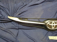 Toyota Starlet Radiator Grille - Light Wear and Tear, one clip broken