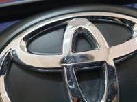 Toyota Starlet Radiator Grille - Light Wear and Tear, one clip broken