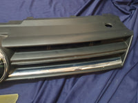 Volkswagen Polo 2018, 2019, 2020, 2021, 2022, 2023 Radiator Grille - Deep abrasion, Wear and Tear, Broken badge