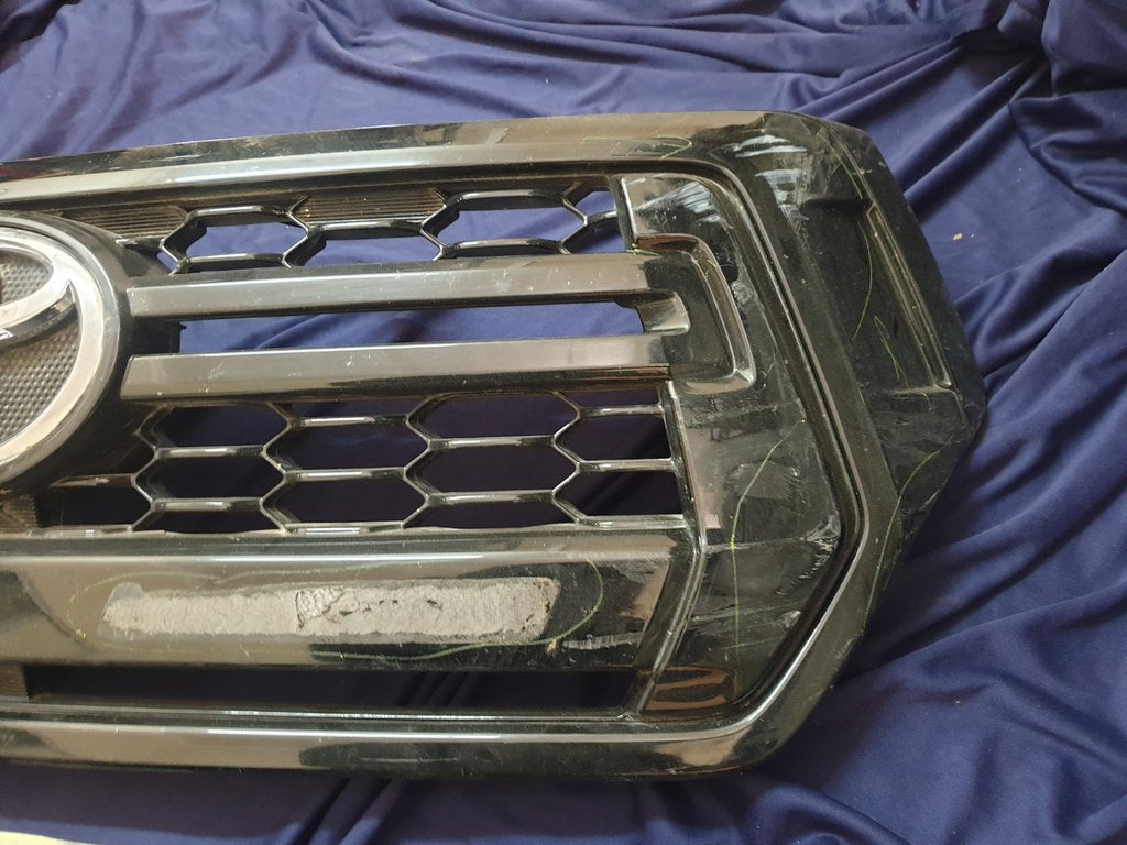 Toyota Hilux Radiator Grille - Chrome Scratches, Deep Scuffs
