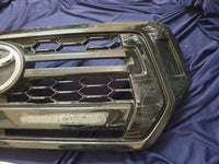 Toyota Hilux Radiator Grille - Chrome Scratches, Deep Scuffs